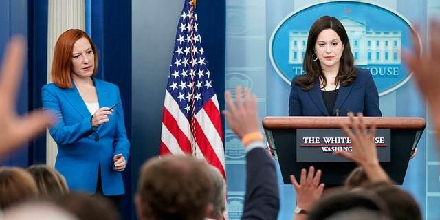 White House press secretary Jen Psaki, left, calls on a reporter as Anne Neuberger, Deputy National Security Advisor for Cyber and Emerging Technology, takes questions during a press briefing at the White House, Monday, March 21, 2022, in Washington.