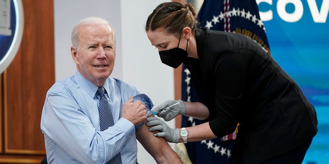 President Biden will receive his second COVID-19 booster shot at the South Court Auditorium on the White House campus in Washington on March 30, 2022.