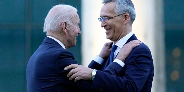 President Biden and NATO Secretary General Jens Stoltenberg speak while visiting a memorial to the September 11 terrorist attacks at NATO headquarters in Brussels, June 14, 2021.