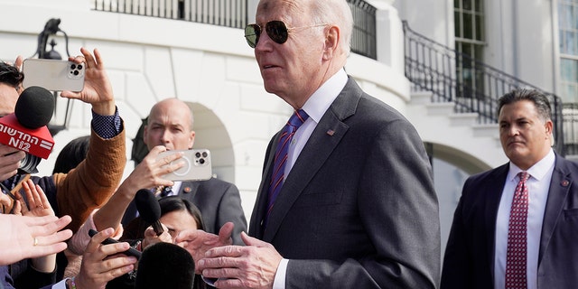 President Biden talks to the media before boarding Marine One on the South Lawn of the White House, Wednesday, March 2, 2022, in Washington. (AP Photo/Alex Brandon)
