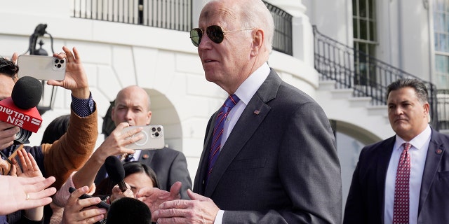 President Biden talks to the media before boarding Marine One on the South Lawn of the White House, March 2, 2022.