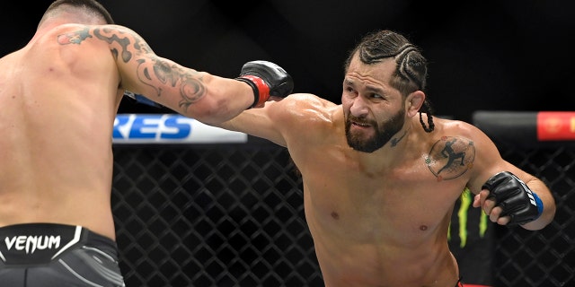 Jorge Masvidal praised former President Trump and Florida Gov. Ron DeSantis after losing the last fight of his career on Saturday. He also led the crowd in a "Let's go, Brandon" chant.
