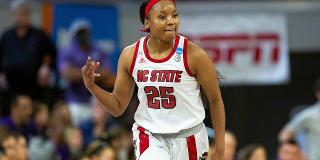 North Carolina State's Kayla Jones (25) reacts after a 3-point basket during the first half of a college basketball game against Kansas State in the second round of the NCAA tournament in Raleigh, N.C., Monday, March 21, 2022.