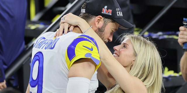 Matthew Stafford of the Los Angeles Rams celebrates with his wife Kelly Stafford during Super Bowl LVI at SoFi Stadium on February 13, 2022 in Inglewood, California.