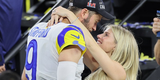 Matthew Stafford of the Los Angeles Rams celebrates with his wife Kelly Stafford during Super Bowl LVI at SoFi Stadium on Feb. 13, 2022 in Inglewood, California.