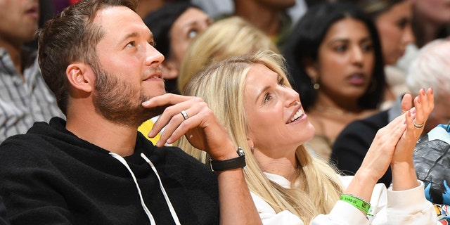 Super Bowl Champion, Matthew Stafford and Kelly Stafford attend a game between the Golden State Warriors and Los Angeles Lakers on March 5, 2022, at Crypto.Com Arena in Los Angeles, California.