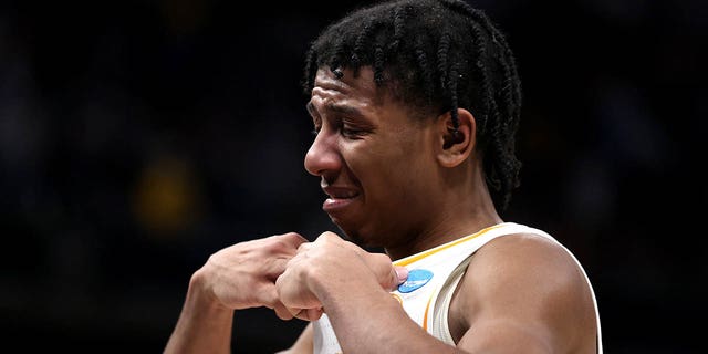 Kennedy Chandler of the Tennessee Volunteers reacts after losing to the Michigan Wolverines, 76-68, at Gainbridge Fieldhouse on March 19, 2022, in Indianapolis.