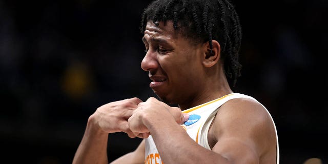 Kennedy Chandler of the Tennessee Volunteers reacts after losing to the Michigan Wolverines, 76-68, at Gainbridge Fieldhouse on March 19, 2022, in Indianapolis.