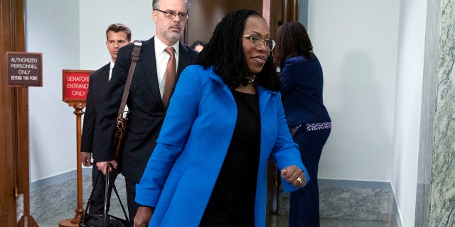 Supreme Court nominee Ketanji Brown Jackson arrives for the third day of her confirmation hearing before the Senate Judiciary Committee on Capitol Hill, in Washington, Wednesday, March 23, 2022.