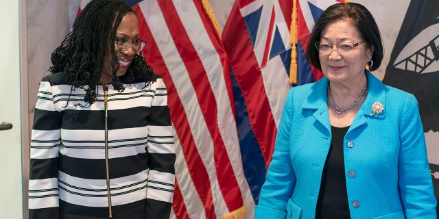 Supreme Court nominee Ketanji Brown Jackson speaks with Sen. Mazie Hirono outside her Capitol Hill office on March 8, 2022.