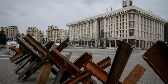 Anti-tank constructions are seen in central Kyiv, Ukraine, on Monday. (Reuters)