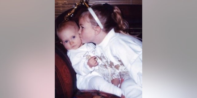 Author Kyleigh Leddy (above, left) as a small child, with her older sister, Kaitlyn. The two were inseparable for years. "My sister was a force: funny and wild and unpredictable and as fickle as a summer storm," Leddy writes.