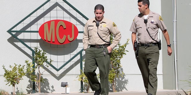 Los Angeles County Sheriff's deputies exit Men's Central Jail in downtown Los Angeles. The commission that oversees the sheriff's department is launching an investigation to get a scope of the prevalence of alleged deputy gangs within the agency.