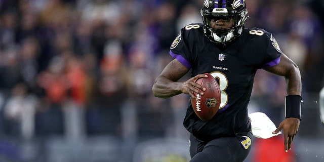 Lamar Jackson #8 of the Baltimore Ravens passes during a game against the Cleveland Browns at M&T Bank Stadium on November 28, 2021 in Baltimore, Maryland.