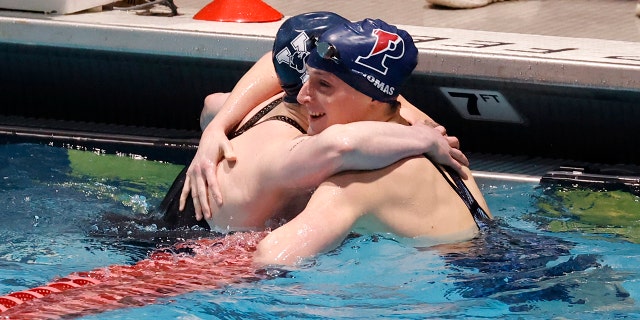 Leah Thomas reveals that she will come out as a trance, rejects those who half support her: "I'm a woman" 1 Leah Thomas of Pennsylvania, right, receives a hug from Isaac Hennig of Yale after Thomas won the 100-yard freestyle final and Hennig finished second at the Ivy League Women's Swimming and Diving Championships at Harvard on Saturday, February 19, 2022. ., in Cambridge, Massachusetts.