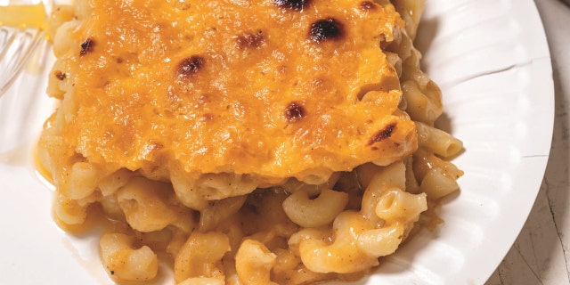 A heaping slice of Creamy and Crusty Mac and Cheese, from the new book "Food IQ." 