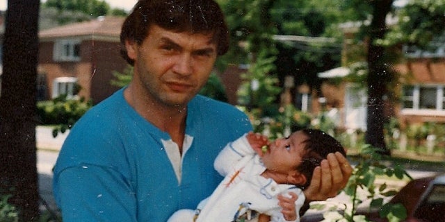 This undated photo shows Jack Barsky and his infant daughter, Chelsea.