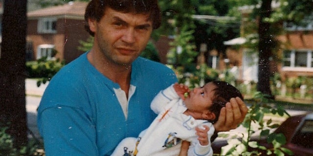 This undated photo shows Jack Barsky and his infant daughter, Chelsea.