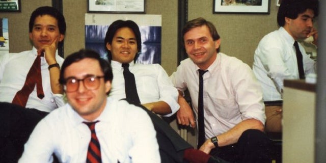 This undated photo shows Jack Barsky and his colleagues at MetLife.