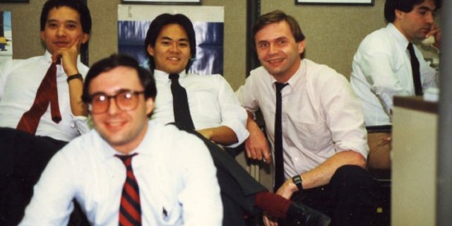 This undated photo shows Jack Barsky and his colleagues at MetLife.