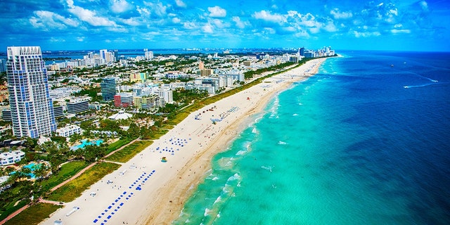 The white sands and turquoise ocean of Miami Beach, Florida as shot from an altitude of about 500 feet during a helicopter photo flight.