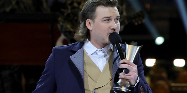 Morgan Wallen appeared to move on from his public scandal as he took home an award for album of the year with "Dangerous: The Double Album."