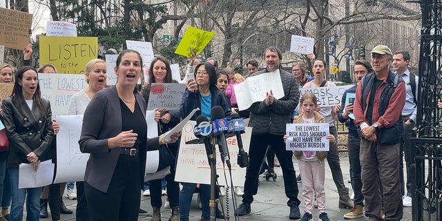 NYC parent Daniela Jampel speaks at an anti-mask rally outside City Hall March 7, 2022.