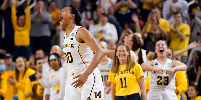 Michigan forward Naz Hillmon (00) and the team react during the closing seconds of the second half of a college basketball game in the second round of the NCAA tournament against Villanova, Monday, March 21, 2022, in Ann Arbor, Mich.