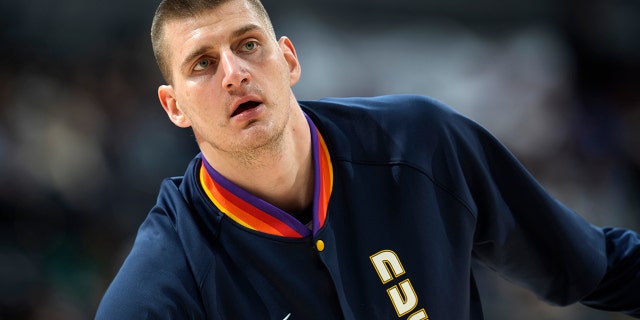 Denver Nuggets center Nikola Jokic warms up for the team's NBA basketball game against the Los Angeles Clippers on Tuesday, March 22, 2022, in Denver.