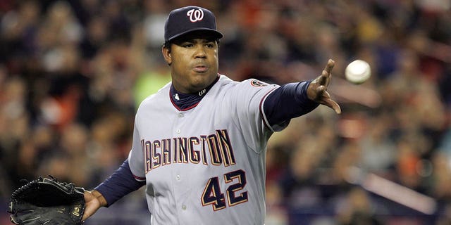 Odalis Perez of the Washington Nationals fields the ball for an out against the New York Mets on April 15, 2008 at Shea Stadium in New York City. The players and coaches of both teams all wore No. 42 in honor of Jackie Robinson.