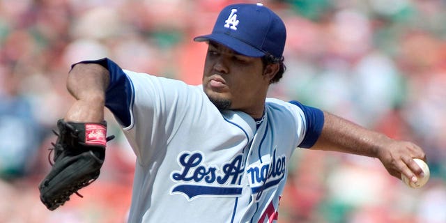 Odalis Perez of the Los Angeles Dodgers pitches against the New York Mets on Aug. 28, 2004, at Shea Stadium in New York City.