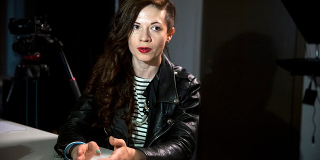 The independent Russian news outlet The Insider said that Oksana Baulina was killed Wednesday when she was documenting the damage of Russian shelling in the Podil district of Kyiv and came under a new strike. (AP Photo/Pavel Golovkin, file)