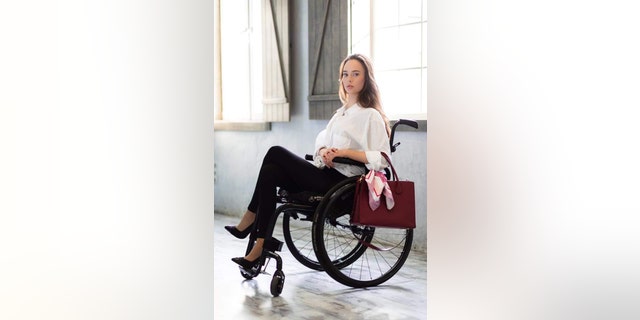 Oksana Kononets said she hopes to find work as a model during her stay in the United States.