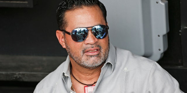 Ozzie Guillen sits in the dugout prior to a game between the White Sox and the Oakland Athletics at Guaranteed Rate Field on Aug. 11, 2019, in Chicago, Illinois.