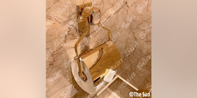 Golden toilet paper roll holder on Putin's yacht.