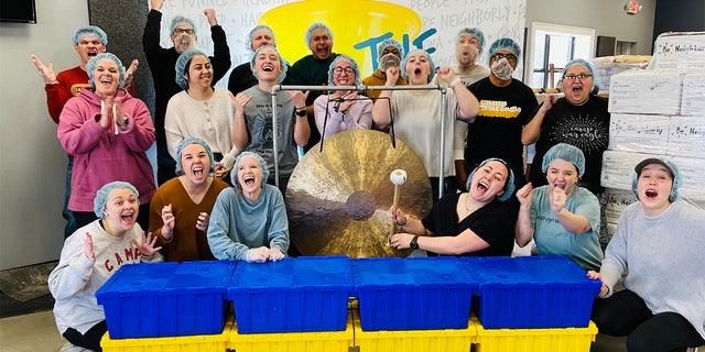 The Pack Shack volunteers helping pack meals for Ukraine refugees. 