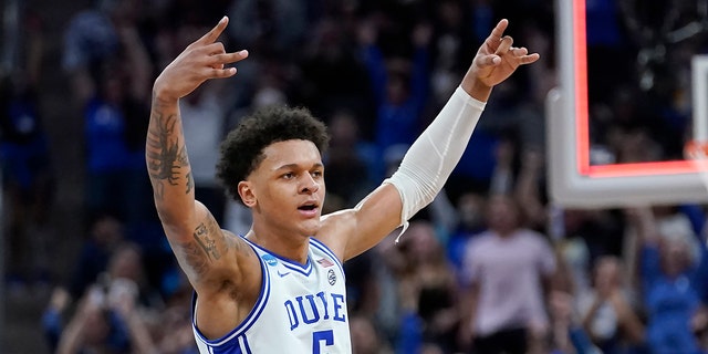 Duke forward Paolo Banchero celebrates during the first half of a game against Arkansas in the Elite 8 of the NCAA men's tournament in San Francisco March 26, 2022.