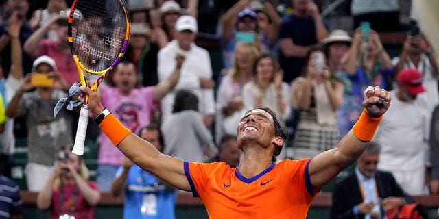 Rafael Nadal, of Spain, celebrates after defeating Carlos Alcaraz, of Spain, during the men's singles semifinals at the BNP Paribas Open tennis tournament Saturday, March 19, 2022, in Indian Wells, Calif. Nadal won 6-4, 4-6, 6-3.