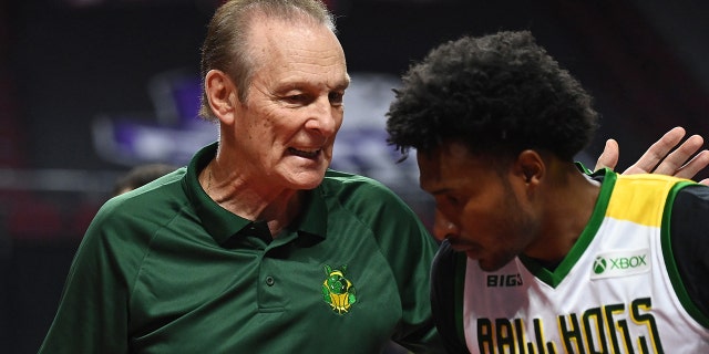 Head coach Rick Barry of Ball Hogs talks with Leonardo Barbosa #19 during a BIG3 game against Power in Week Eight at the Orleans Arena on August 21, 2021 in Las Vegas, Nevada.