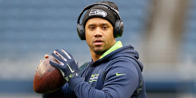 Russell Wilson of the Seahawks warms up before the game against the Detroit Lions at Lumen Field on Jan. 2, 2022 in Seattle, Washington.