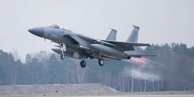 A U.S. Air Force F-15C Eagle assigned to the 493rd Fighter Squadron, Royal Air Force (RAF) Lakenheath, takes off in support of NATO enhanced air policing missions with the Polish Air Force at Lask Air Base, Poland, Feb. 15, 2022.