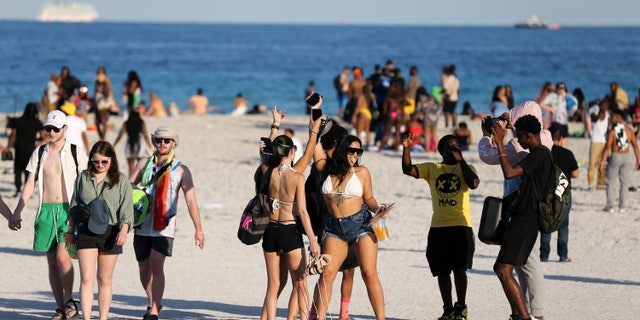 FILE – March 26, 2022: Spring break on Miami Beach
