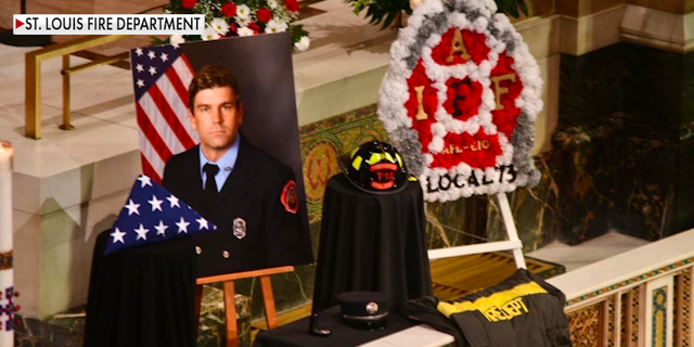 Image from Firefighter Ben Polson's funeral after he was killed fighting a fire in an abandoned building.