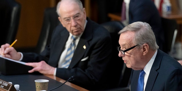 Sen. Chuck Grassley, R-Iowa, the ranking member of the Senate Judiciary Committee, left, listens as Sen. Dick Durbin, D-Ill., chairman of the Senate Judiciary Committee, speaks during Supreme Court nominee Judge Ketanji Brown Jackson's confirmation hearing before the Senate Judiciary Committee on Capitol Hill in Washington March 23, 2022.