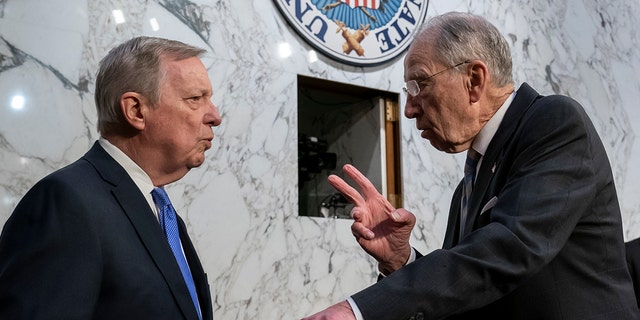 Sen. Dick Durbin, D-Ill., left, chairman of the Senate Judiciary Committee, and Sen. Chuck Grassley, R-Iowa, the ranking member, confer as Supreme Court nominee Ketanji Brown Jackson begins the final day of her confirmation hearing, on Capitol Hill in Washington, Wednesday, March 23, 2022. 