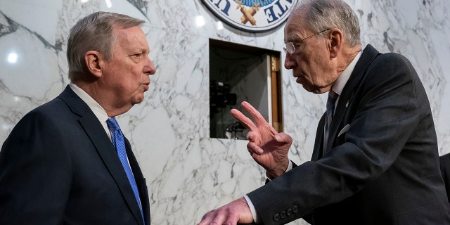 Sen. Dick Durbin, D-Ill., left, chairman of the Senate Judiciary Committee, and Sen. Chuck Grassley, R-Iowa, the ranking member, confer as Supreme Court nominee Ketanji Brown Jackson begins the final day of her confirmation hearing, on Capitol Hill in Washington, Wednesday, March 23, 2022.