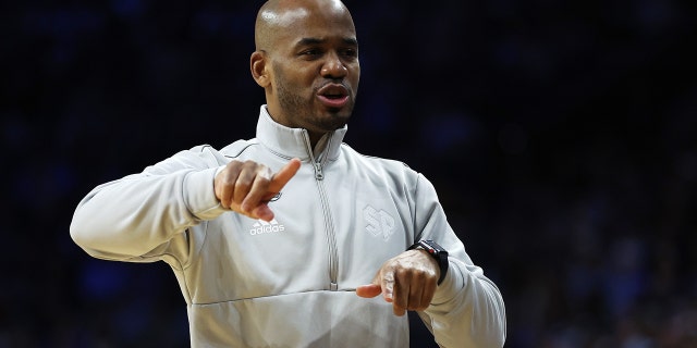 Head coach Shaheen Holloway of the St. Peter's Peacocks reacts on the sidelines in the first half of the game against the Purdue Boilermakers in the Sweet Sixteen round game of the 2022 NCAA Men's Basketball Tournament at Wells Fargo Center on March 25, 2022 in Philadelphia, Pennsylvania.