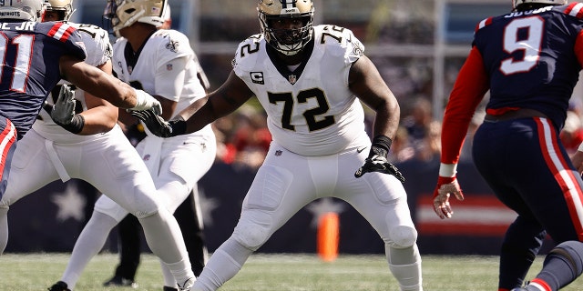FILE - New Orleans Saints offensive tackle Terron Armstead looks to block against the New England Patriots during an NFL football game Sept. 26, 2021, in Foxborough, Mass. Armstead announced Tuesday night, March 22, that he’s signing with the Miami Dolphins.