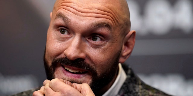 Tyson Fury attends a press conference at Wembley Stadium, London, Tuesday, March 1, 2022.