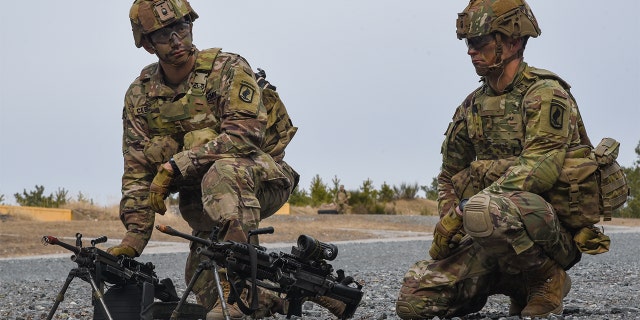 U.S. Army paratroopers prepare for a blank fire exercise at the 7th Army Training Command’s Grafenwoehr Training Area, Germany, March 15, 2022.